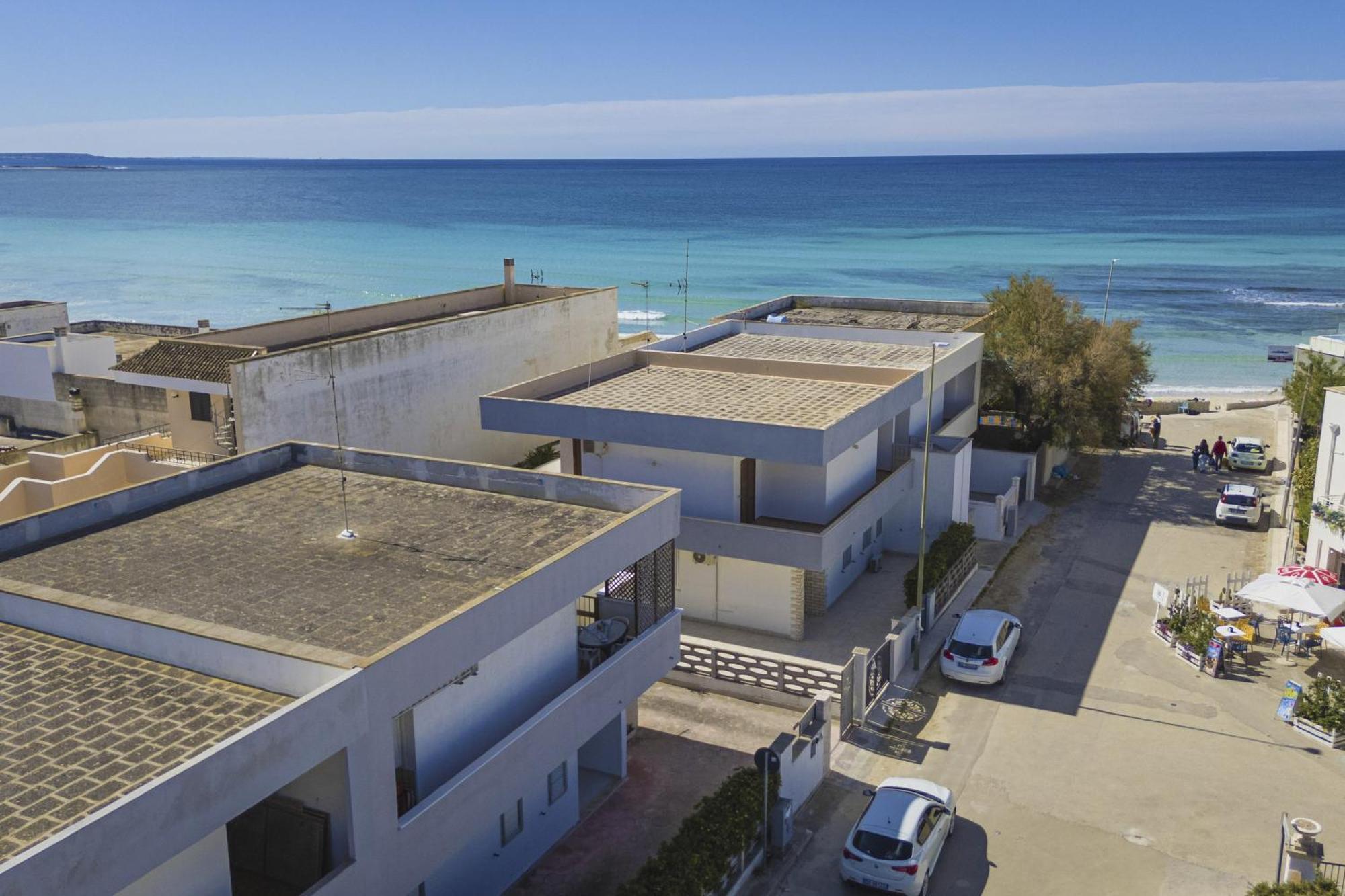 Torre Lapillo Apartment Sea View - Happy Rentals 切萨雷奥港 外观 照片