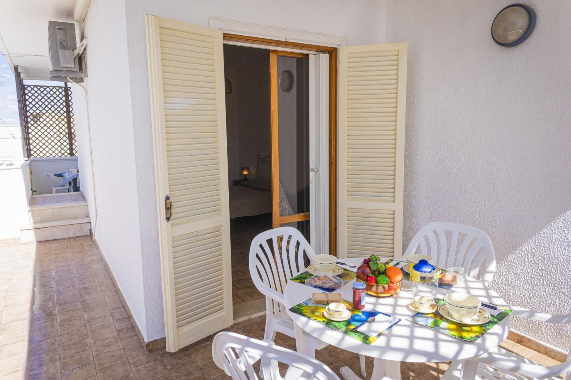 Torre Lapillo Apartment Sea View - Happy Rentals 切萨雷奥港 外观 照片